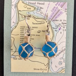 Fair Trade Sterling Silver Fishing Float pierced earrings in original display